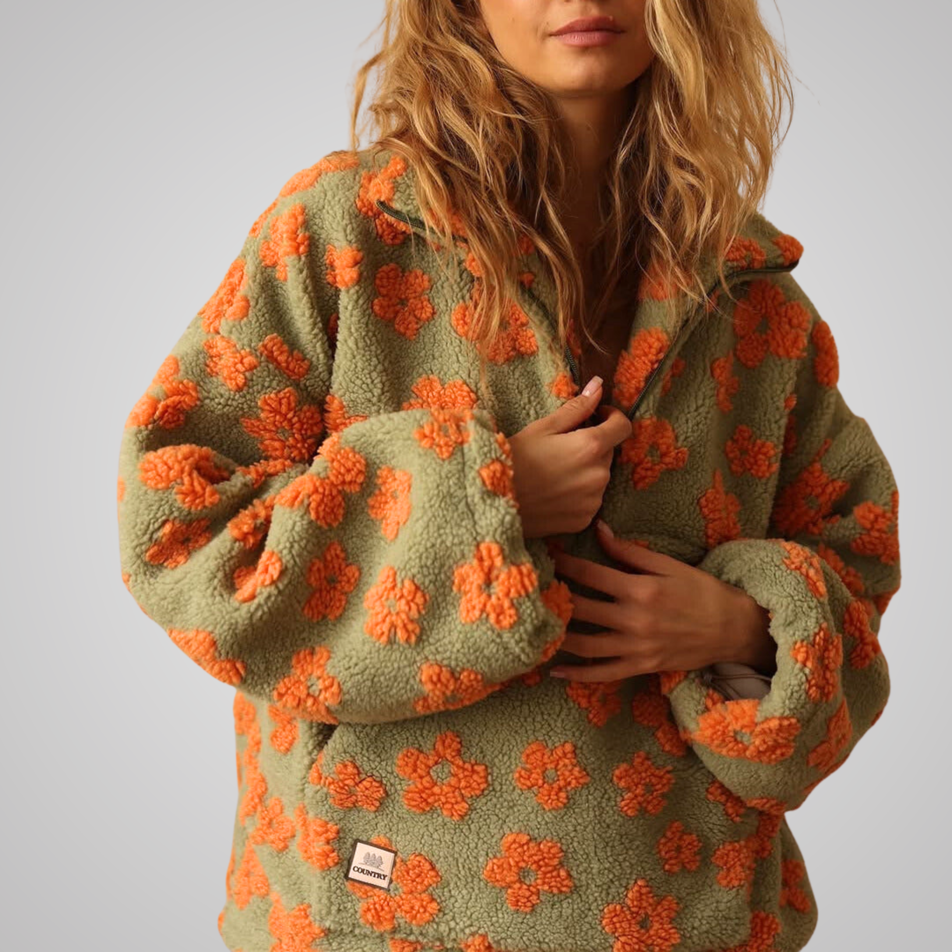 Elena - Pull fleuri en polaire sherpa avec demi-zip